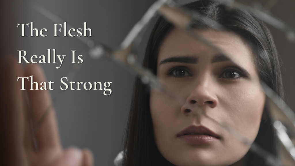 Woman looking through shattered glass representing spiritual blindness and the struggle against the flesh